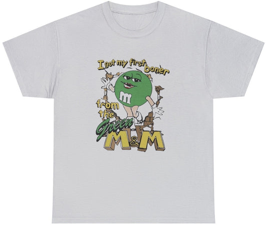 Funny I Got My First Boner From The Green M&M T-Shirt featuring adult humor and meme-inspired design, perfect for casual wear and humor lovers.