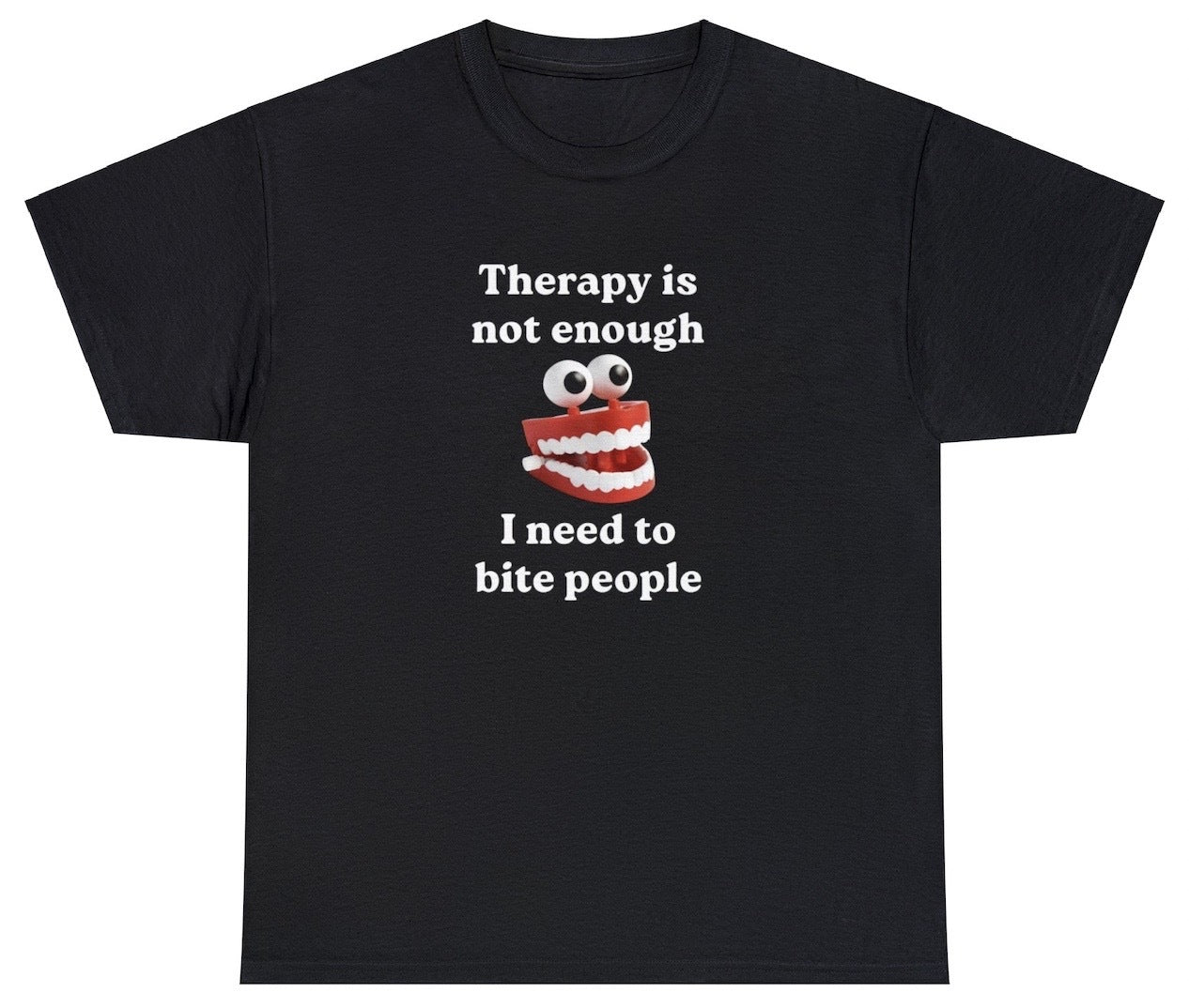 "Bold 'Therapy Is Not Enough I Need To Bite Someone' t-shirt, perfect for fans of dark humor and quirky statements. Ideal for casual wear and funny gifts."
