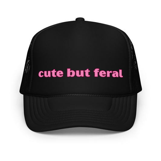 Funny mesh trucker hat for women with bold text that says “Cute But Feral” — a hilarious and inappropriate hat with a wild saying, perfect for girls' nights, festivals, and fans of crazy hats with bold personality.