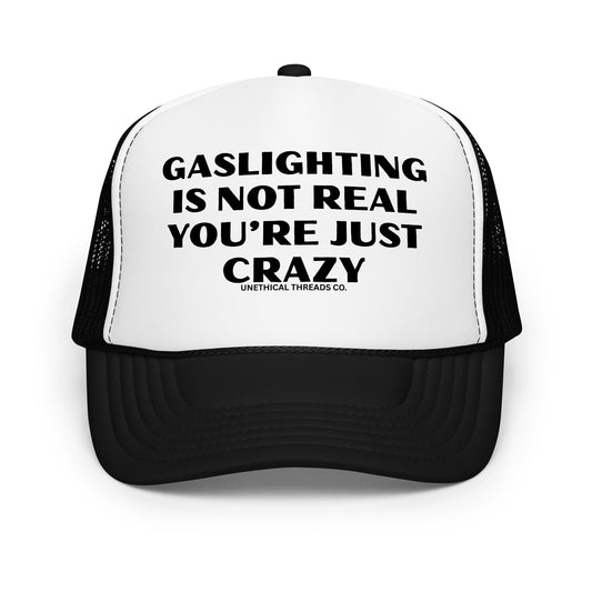 Funny mesh trucker hat for men with bold text that says “Gaslighting Is Not Real You're Just Crazy” — a hilarious and inappropriate hat with wild sayings, perfect for parties, edgy humor fans, and lovers of crazy funny hats for men.
