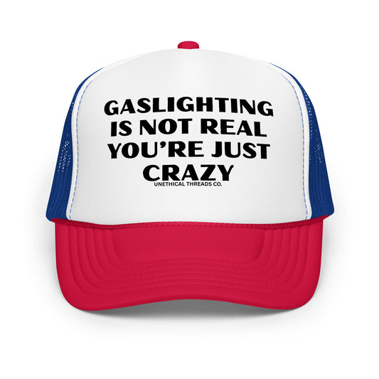 Funny mesh trucker hat for men with bold text that says “Gaslighting Is Not Real You're Just Crazy” — a hilarious and inappropriate hat with wild sayings, perfect for parties, edgy humor fans, and lovers of crazy funny hats for men.