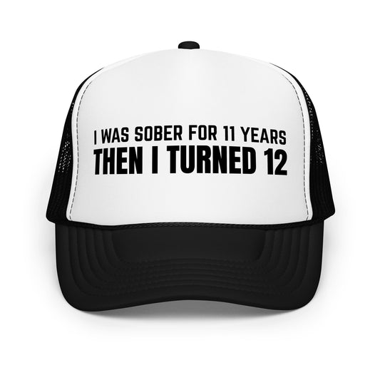 Funny drinking trucker hat with bold white text that says “I Was Sober For 11 Years Then I Turned 12” — a hilarious mesh-back hat for men who love beer hats, inappropriate jokes, and crazy humor at parties or tailgates.