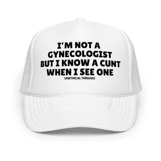 Funny inappropriate trucker hat with bold white text that says “I'm Not A Gynecologist But I Know A Cunt When I See One” — a crazy mesh-back hat with dark humor, perfect for parties, bold personalities, and fans of outrageous funny hats for men.