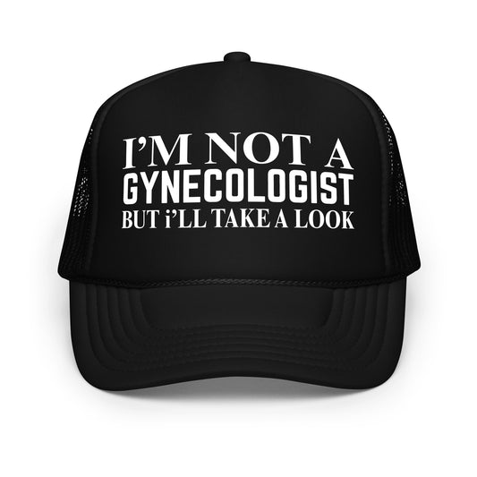 Funny inappropriate trucker hat for men with bold white text that says “I’m Not A Gynecologist But I’ll Take A Look” — a hilarious mesh-back hat with outrageous humor perfect for parties, drinking nights, or bold personalities.