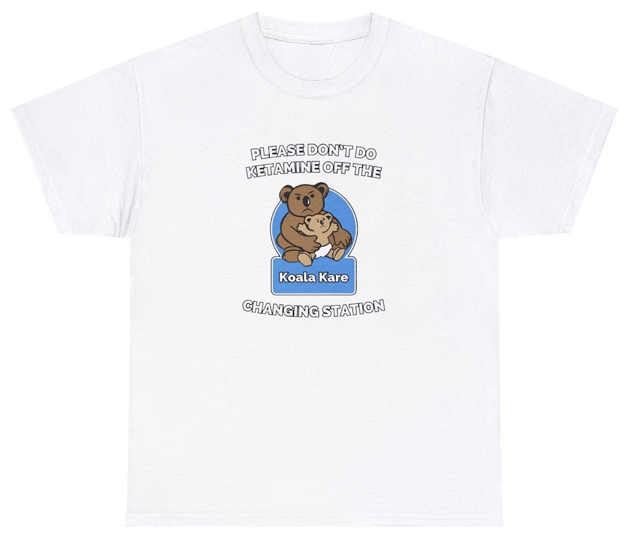 "Cheeky 'Please Don't Do Ketamine Off The Changing Station' t-shirt, perfect for fans of bold humor and edgy statements. Ideal for casual wear and bold gifts."