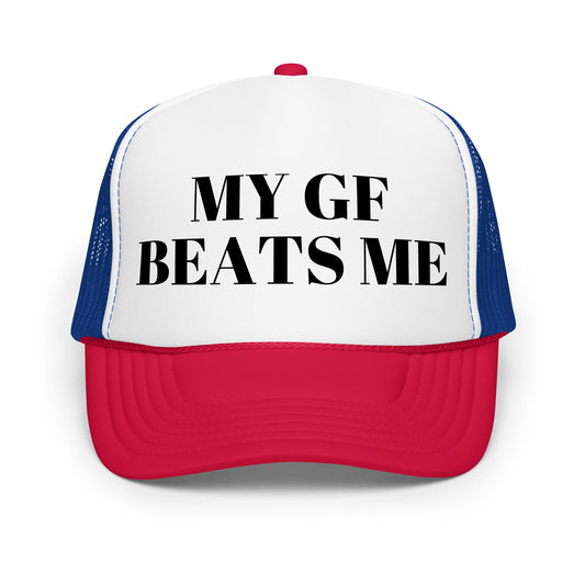 Crazy funny trucker hat for men with bold text that says “My GF Beats Me” — a dark humor mesh-back hat designed for guys who love inappropriate jokes, outrageous sayings, and wild party conversations.