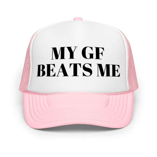 Crazy funny trucker hat for men with bold text that says “My GF Beats Me” — a dark humor mesh-back hat designed for guys who love inappropriate jokes, outrageous sayings, and wild party conversations.