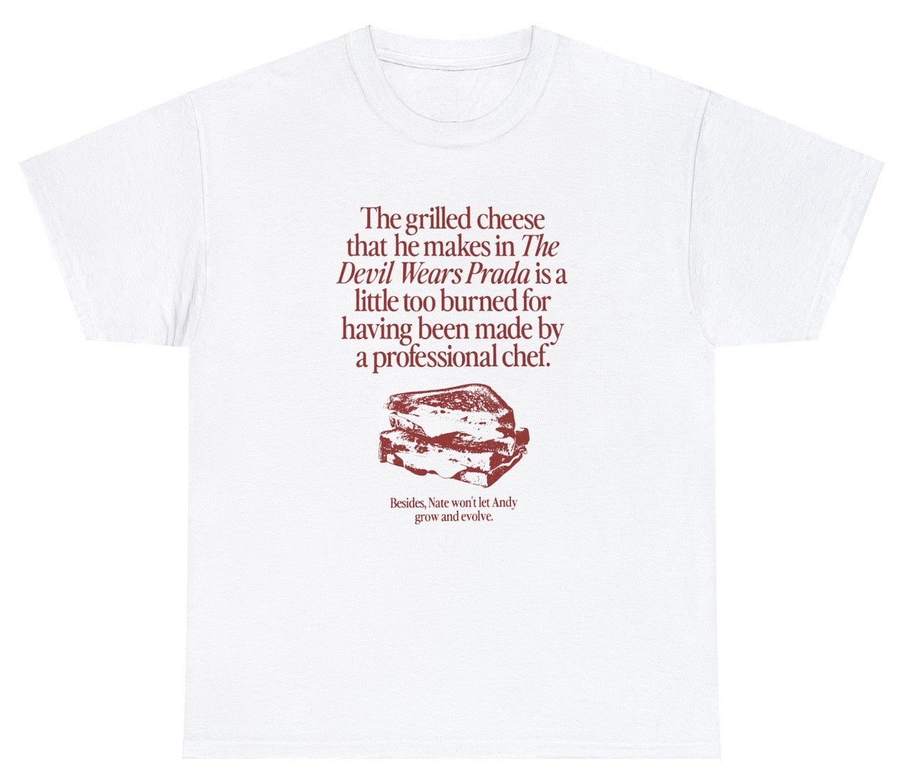 "Playful 'Grilled Cheese' t-shirt featuring cheesy food humor, perfect for foodies and fans of quirky designs."