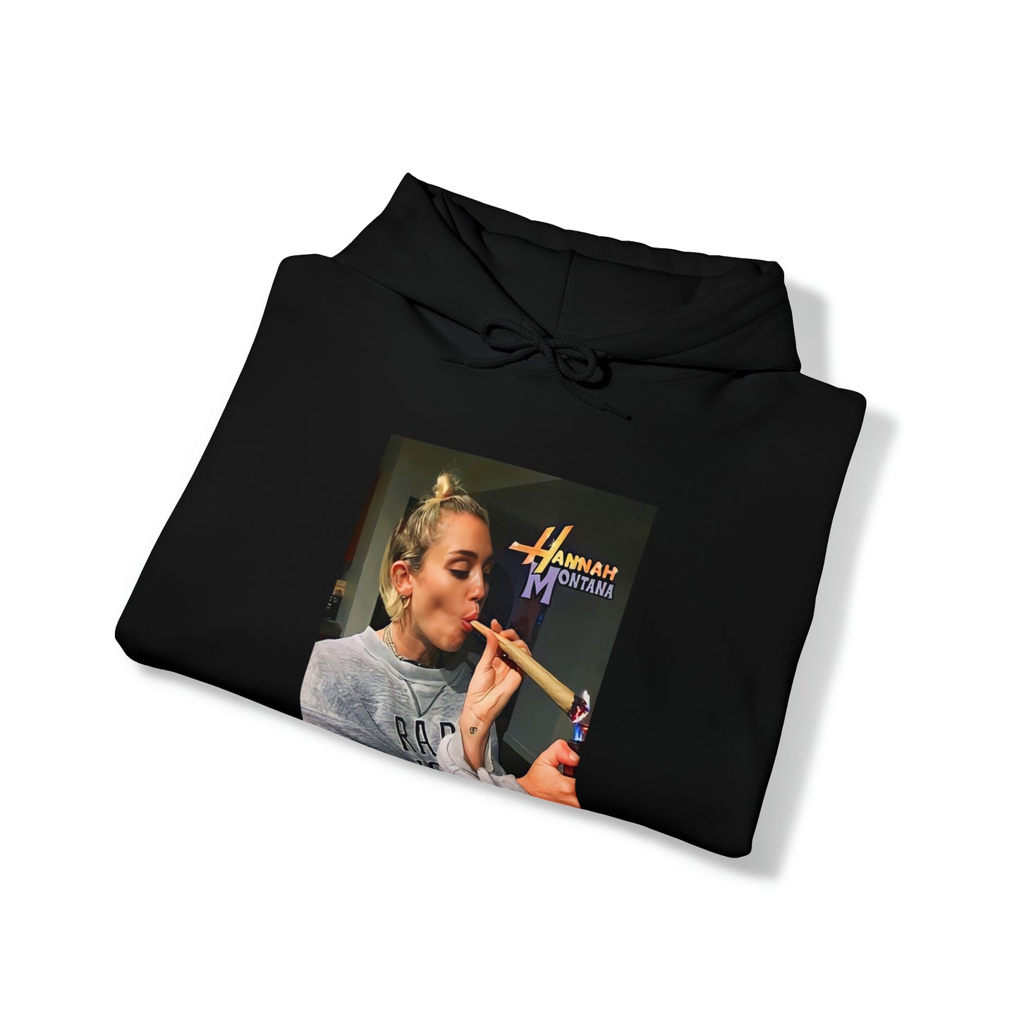 "Funny 'Hannah Montana' hoodie featuring a meme of Miley Cyrus smoking weed, perfect for fans of edgy humor and nostalgic memes."