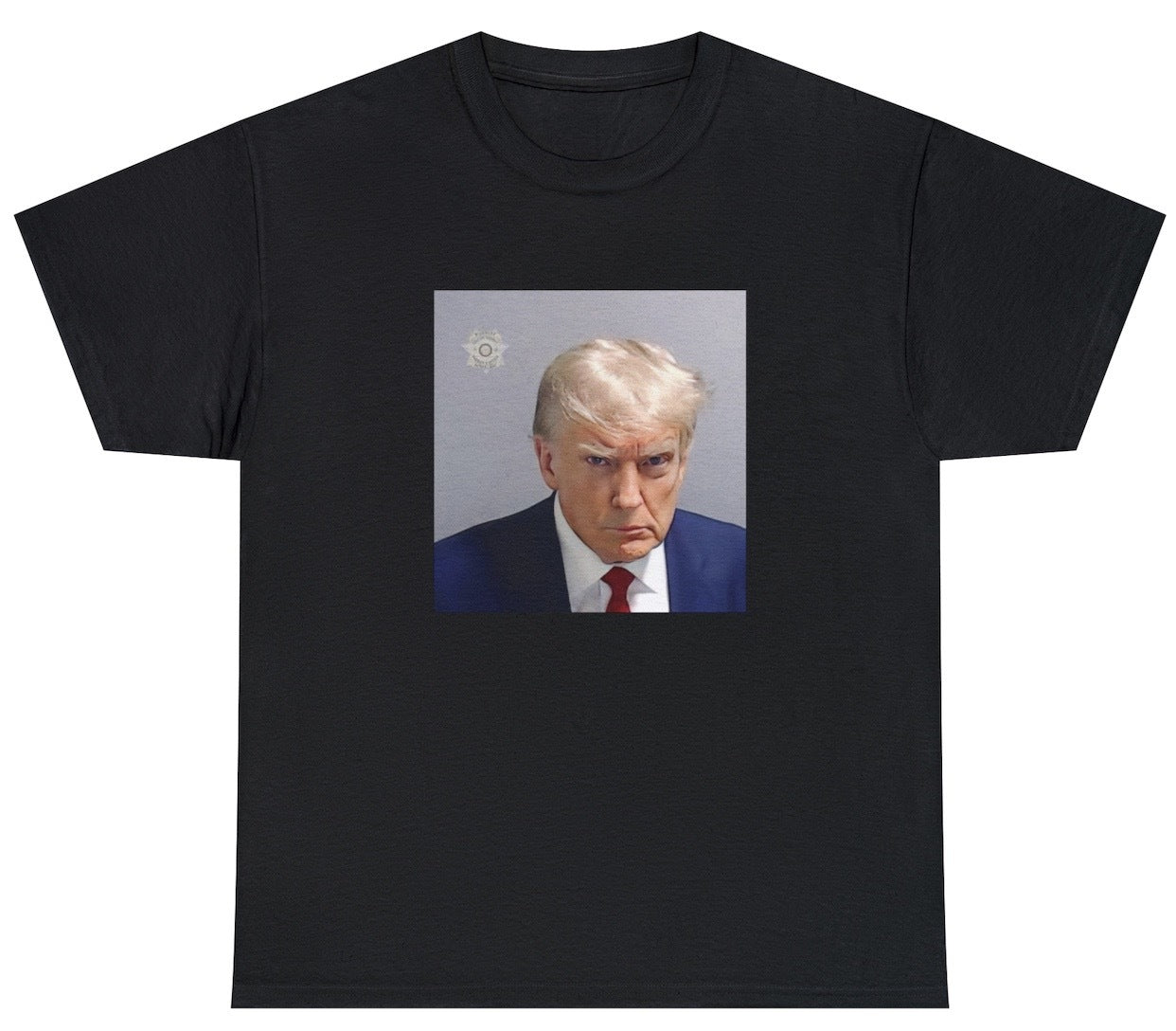 "Bold 'Real Donald Trump Mugshot' t-shirt featuring viral political humor and edgy design, perfect for fans of daring jokes and political satire."

