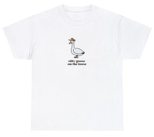 "Playful 'Silly Goose On The Loose' t-shirt featuring quirky humor and whimsical design, perfect for fans of lighthearted and fun tees."

