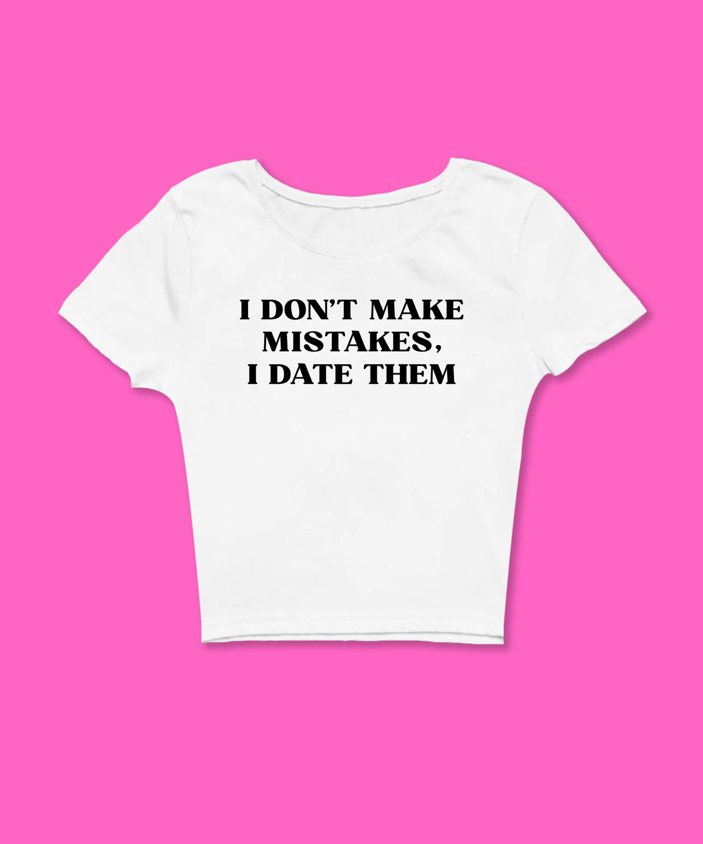 I Don't Make Mistakes I Date Them  Baby Tee featuring a bold graphic and Y2K aesthetic. This funny baby tee is a women’s crop top available as a white baby tee, perfect for those who love graphic baby tees and Y2K baby tee fashion.