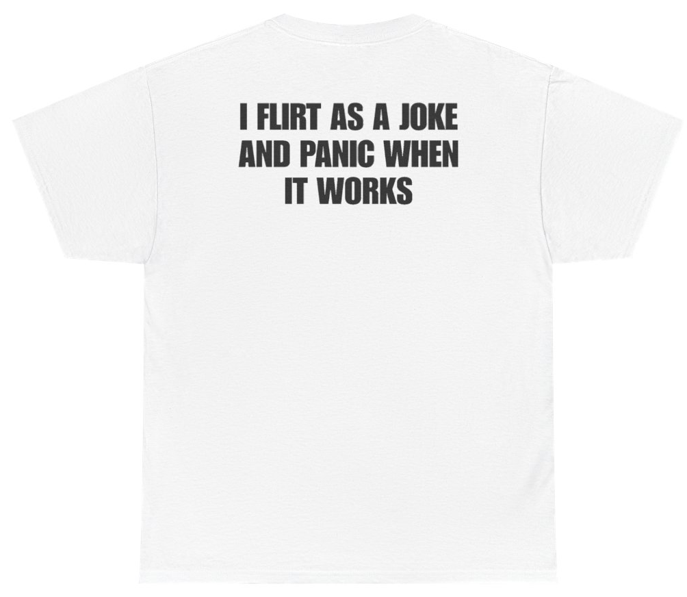 Funny I Flirt As A Joke And Panic When It Works Tee (BACKPRINT) T-Shirt featuring bold sarcastic humor and graphic design, perfect for casual wear and humor lovers