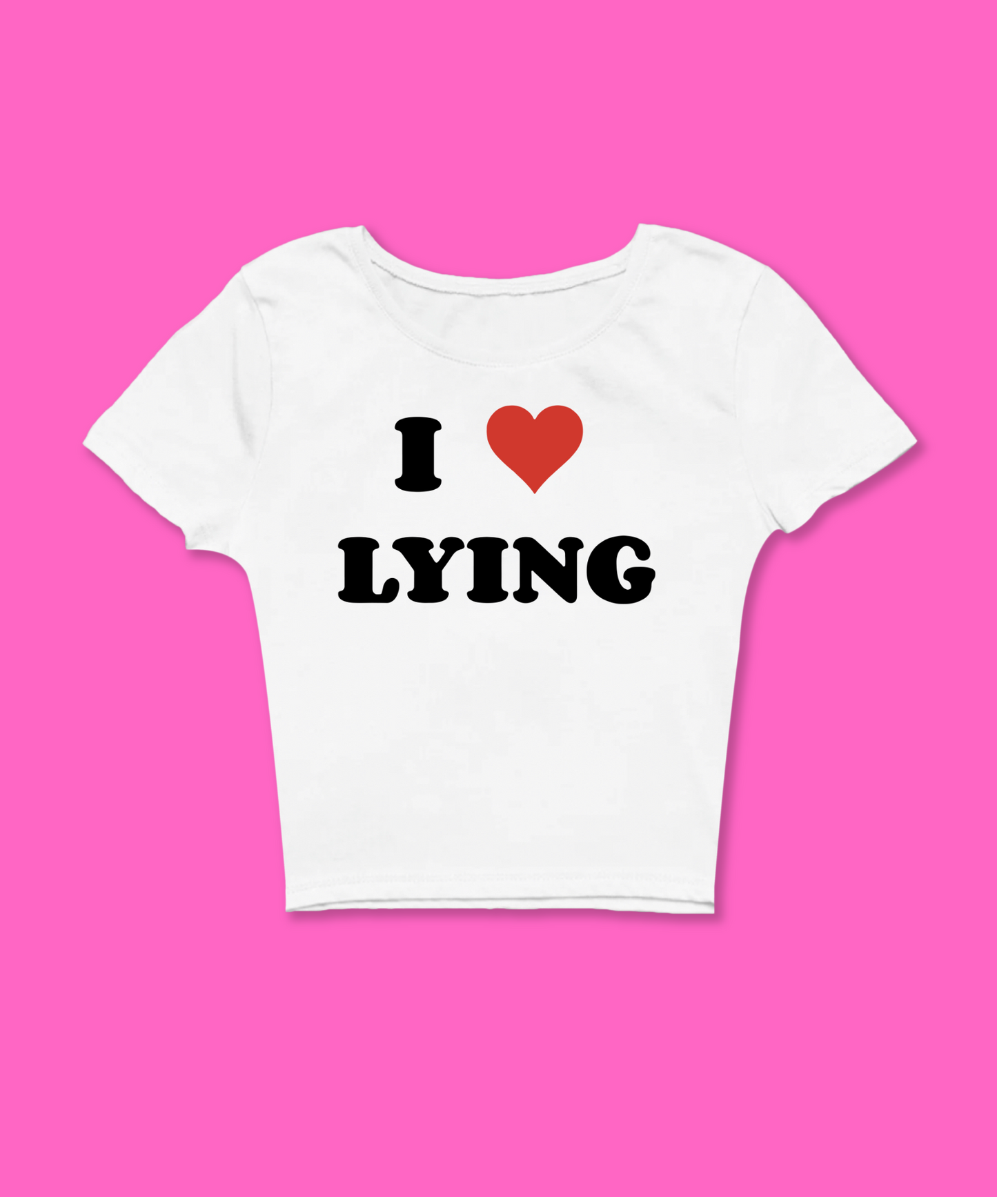 I Love Lying  Baby Tee featuring a bold graphic and Y2K aesthetic. This funny baby tee is a women’s crop top available as a black baby tee or white baby tee, perfect for those who love graphic baby tees and Y2K baby tee fashion.