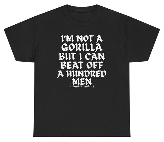 “I'm Not A Gorilla But I Can Beat Off 100 Men” graphic tee with bold text. Viral gym meme shirt blending alpha humor, cursed innuendo, and unhinged confidence for lifters and chaos love