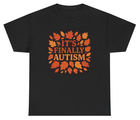 Black t-shirt with orange leaf design and text 'It's Finally Autism' on a white background