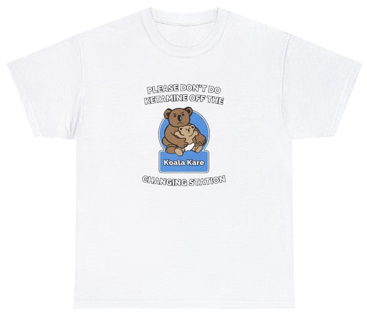"Cheeky 'Please Don't Do Ketamine Off The Changing Station' t-shirt, perfect for fans of bold humor and edgy statements. Ideal for casual wear and bold gifts."

