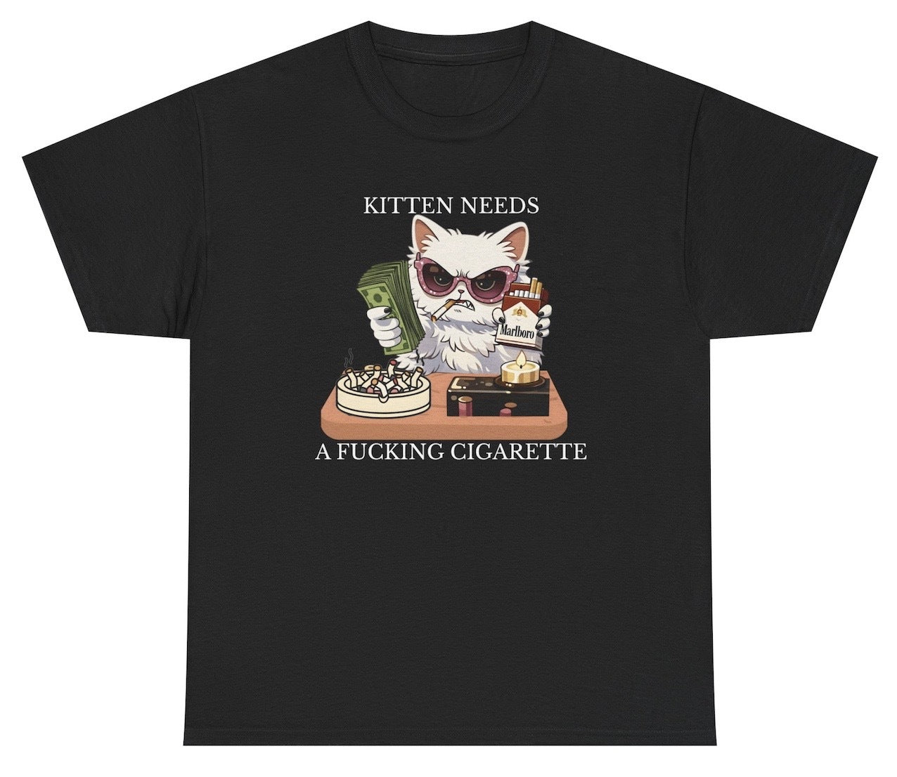 Graphic tee with “Kitten Needs A Fucking Cigarette” for cat and smoking lover humor.