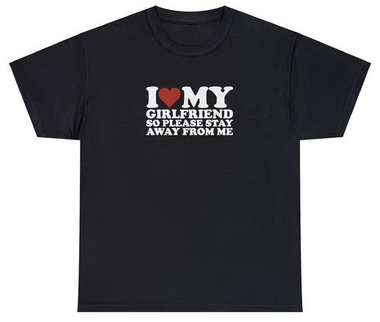 "Playful 'I Love My Girlfriend So Stay Away' t-shirt, perfect for fans of relationship humor. Ideal for casual wear and fun gifts."

