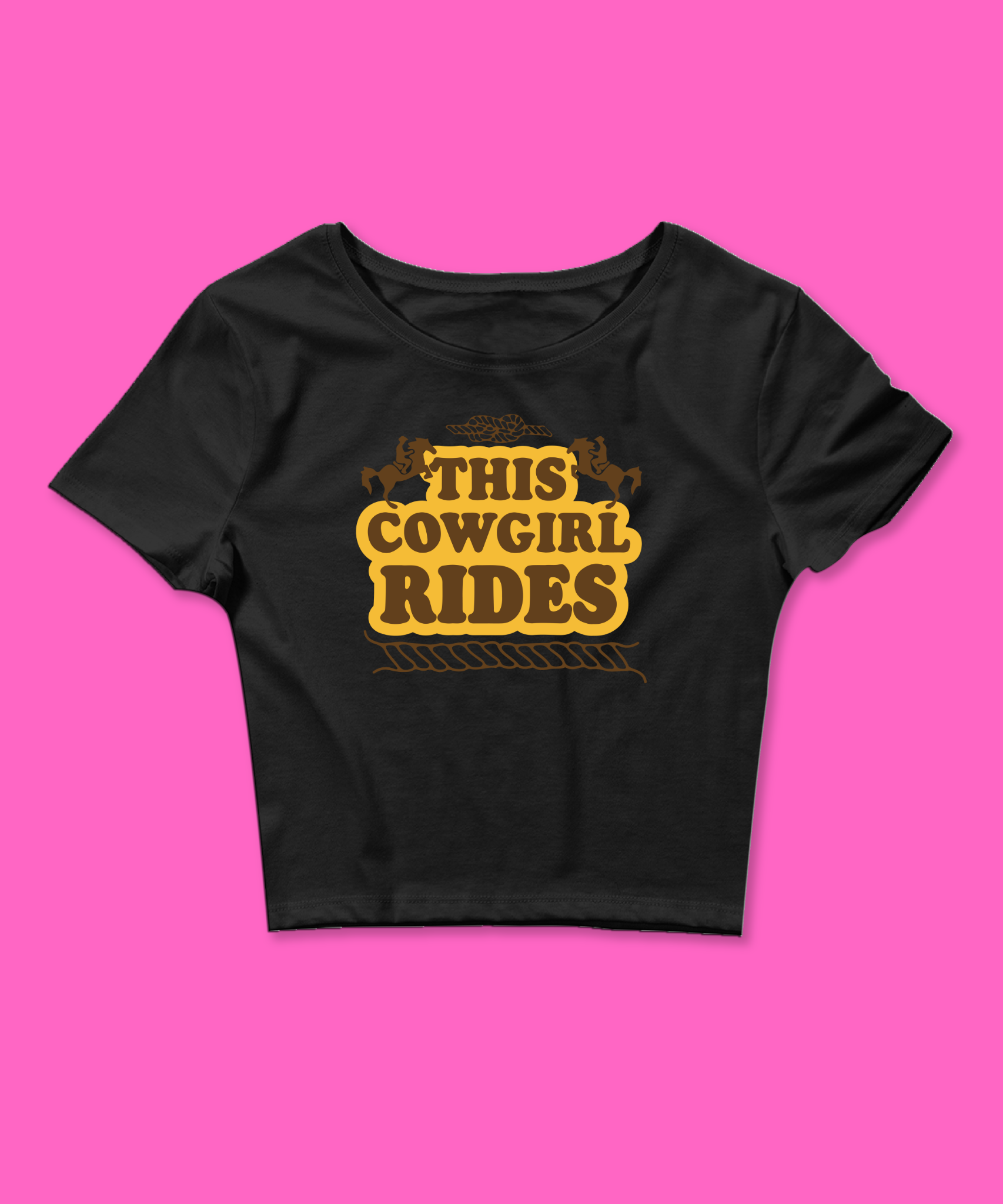 This Cowgirl Rides Baby Tee featuring a bold graphic and Y2K aesthetic. This funny baby tee is a women’s crop top available as a black baby tee or white baby tee, perfect for those who love graphic baby tees and Y2K baby tee fashion.