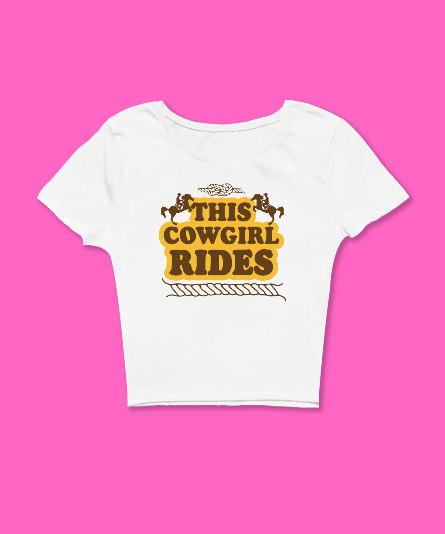 This Cowgirl Rides Baby Tee featuring a bold graphic and Y2K aesthetic. This funny baby tee is a women’s crop top available as a black baby tee or white baby tee, perfect for those who love graphic baby tees and Y2K baby tee fashion.