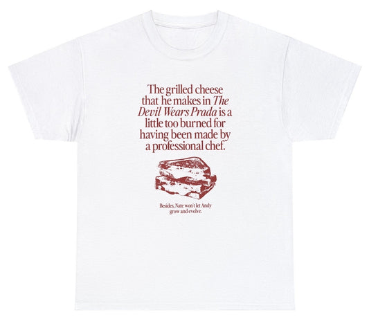 "Playful 'Grilled Cheese' t-shirt featuring cheesy food humor, perfect for foodies and fans of quirky designs."

