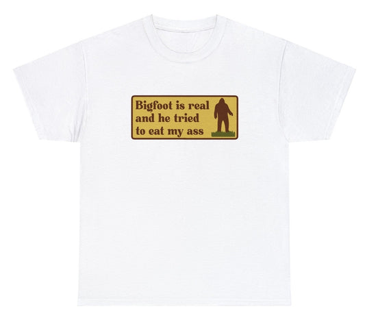 "Funny 'Bigfoot Tried To Eat My Ass' t-shirt featuring bold humor and cryptid-themed design, perfect for fans of quirky humor and Bigfoot."

